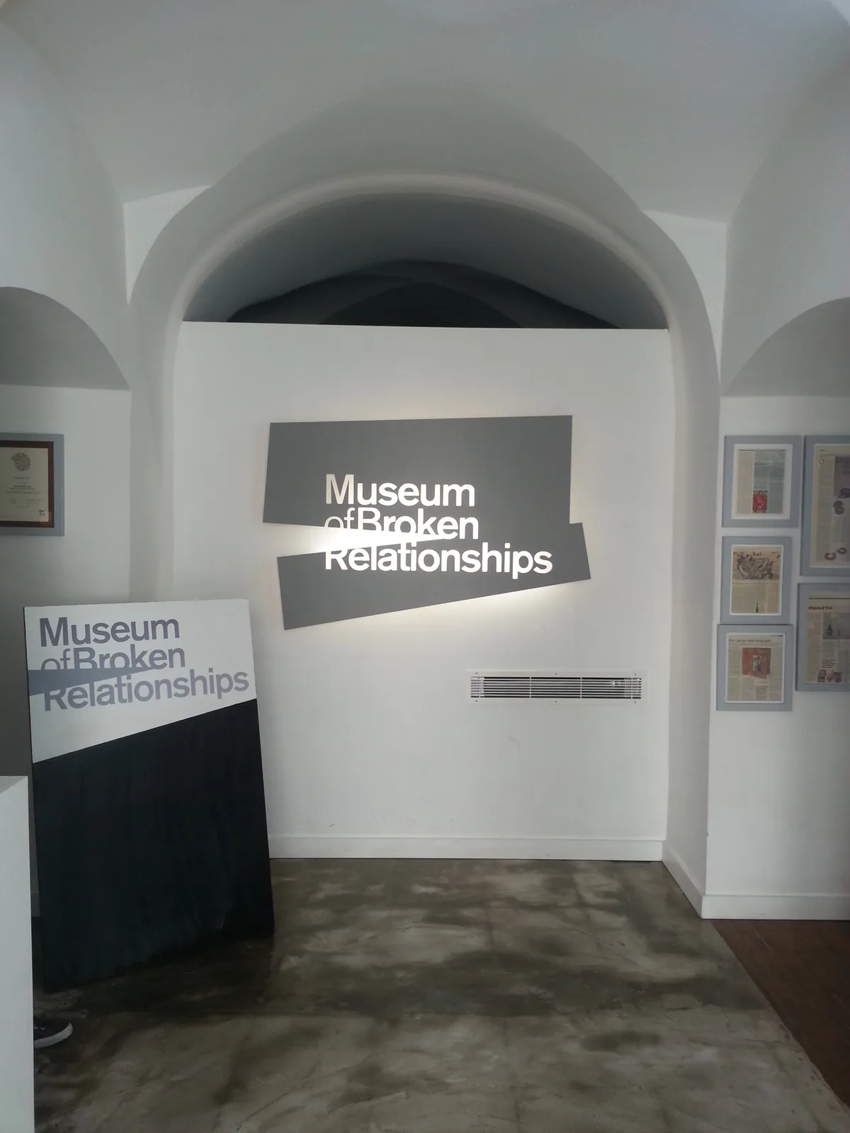 White arched entrance interior at Zagreb's Museum of Broken Relationships