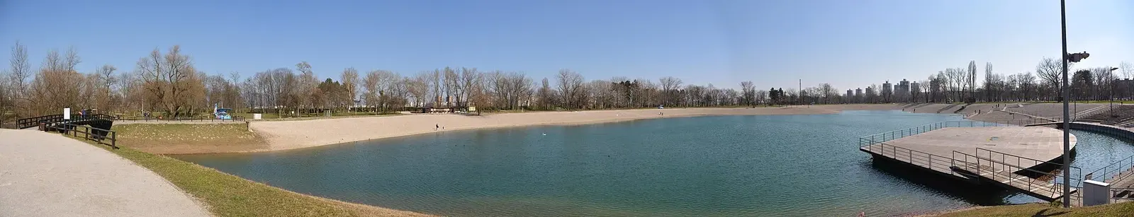 Wide panorama of Bundek lake and paths in Novi Zagreb