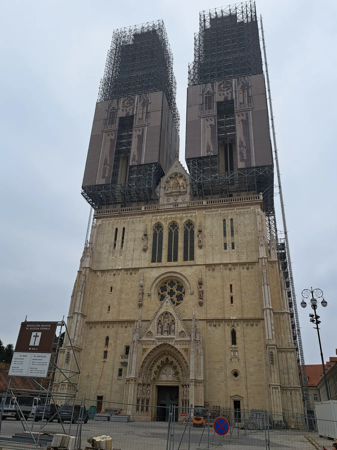 Zagreb Cathedral facade and twin towers enclosed by restoration scaffolding in November 2024
