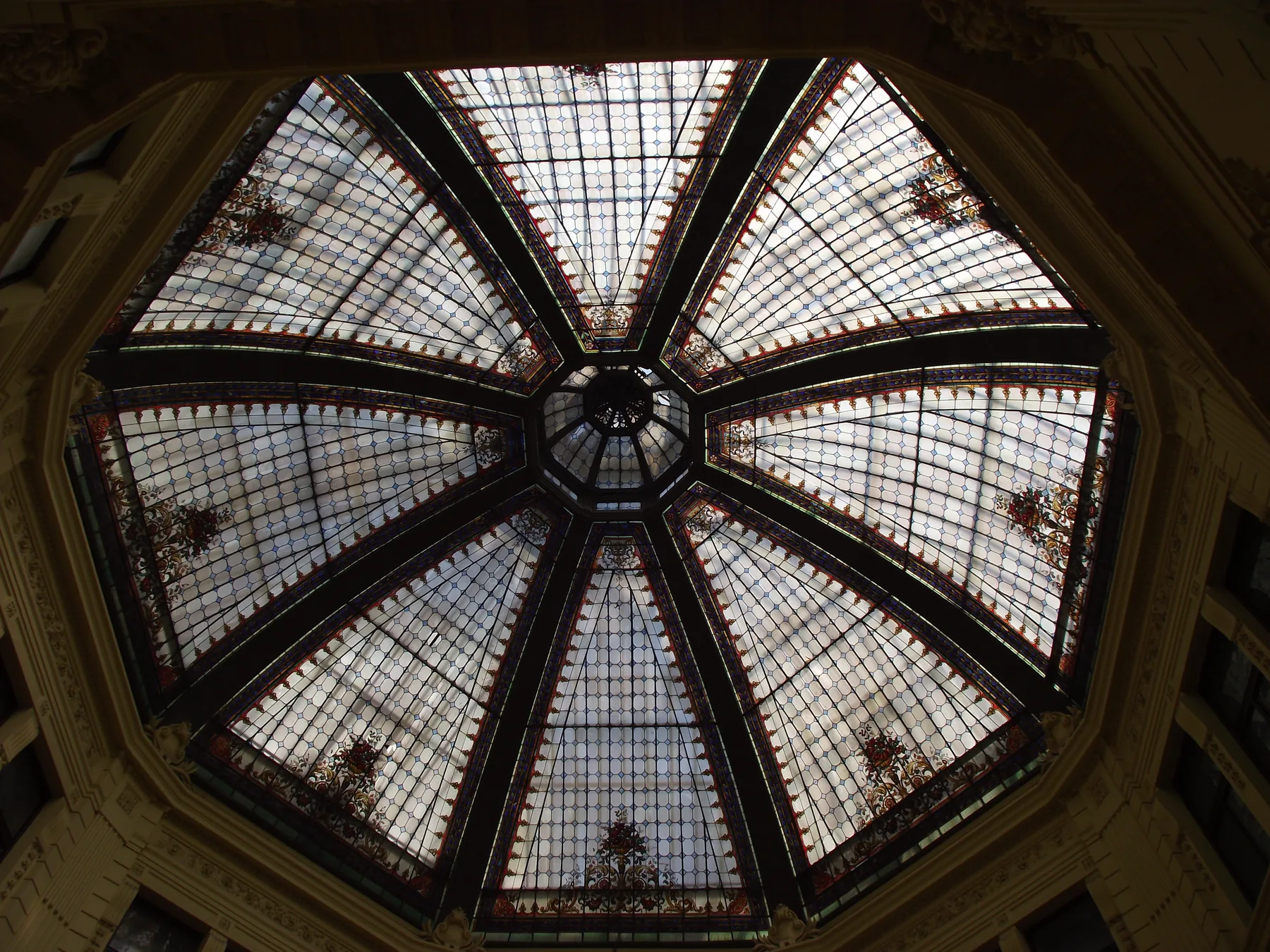 Radial stained-glass ceiling inside the Cvjetni Square passage