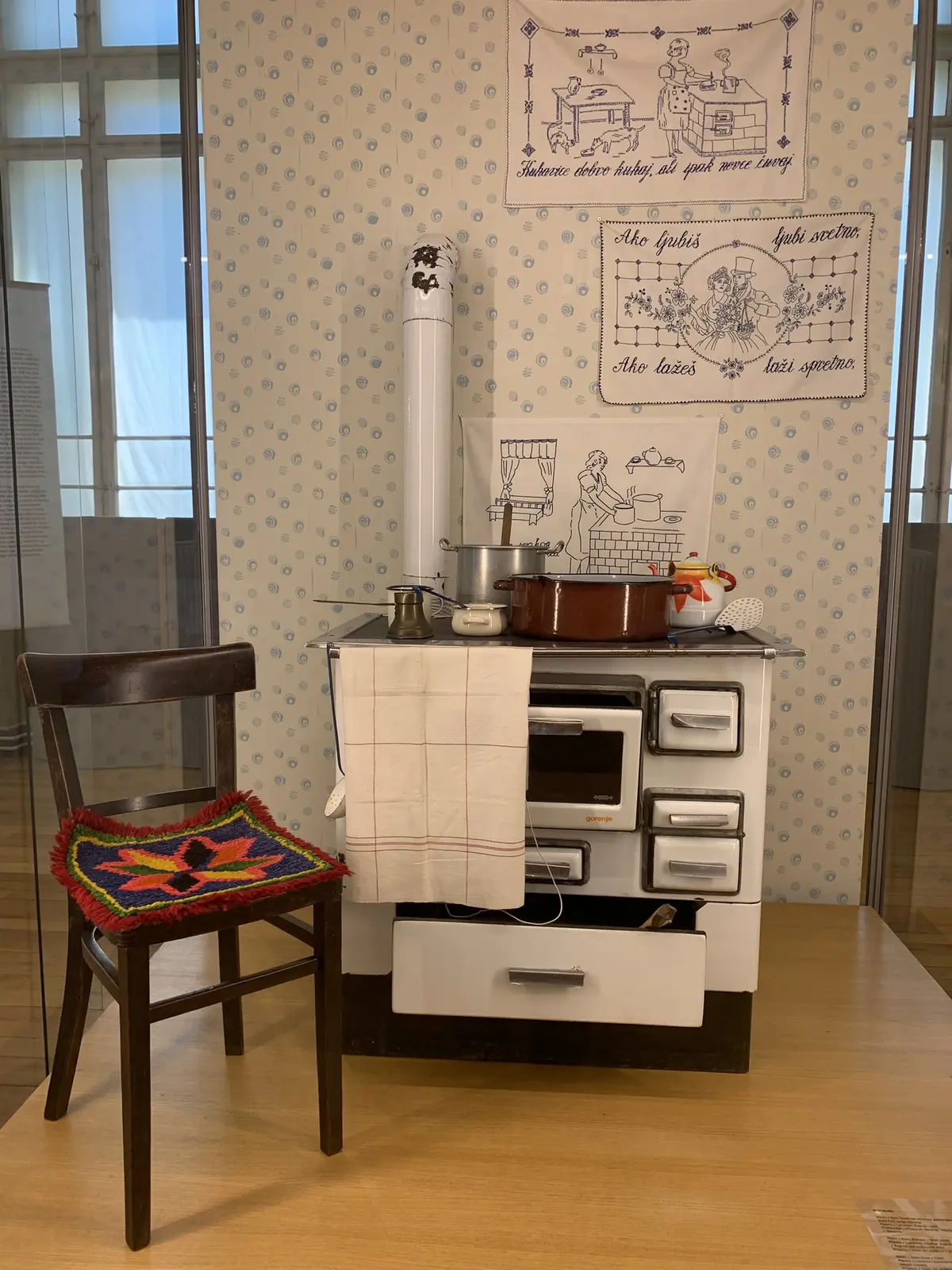 Domestic stove and chair in Zagreb Ethnographic Museum gallery