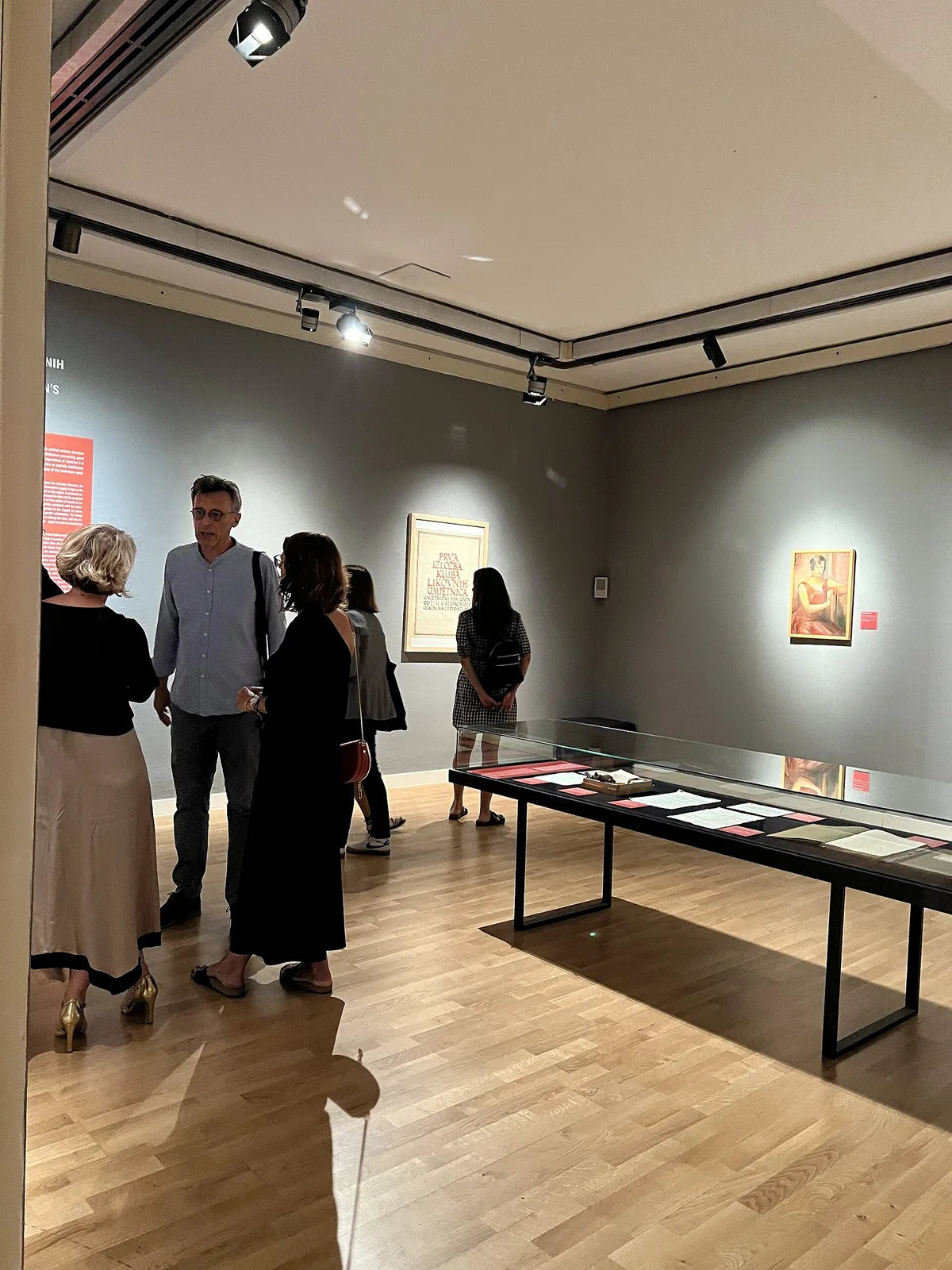 Visitors viewing the 2024 Women Artists Club exhibition at Klovicevi Dvori