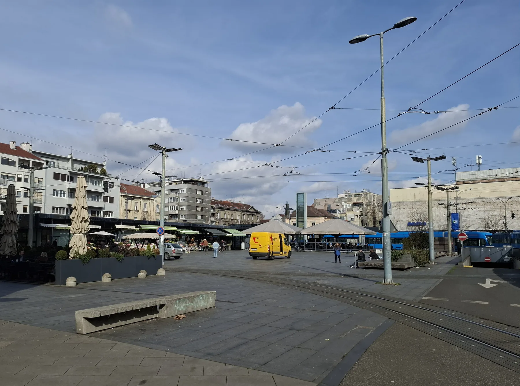 Kvaternik Square tram rails, paving and market edge in February 2025
