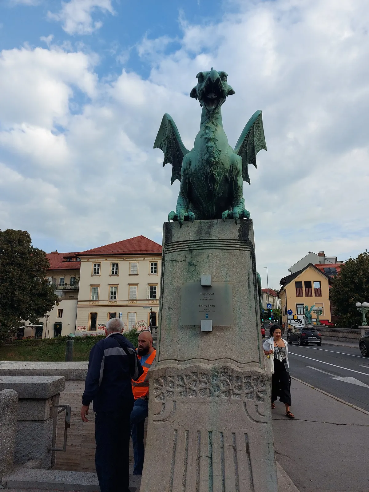 Green copper dragon statue on Dragon Bridge in Ljubljana