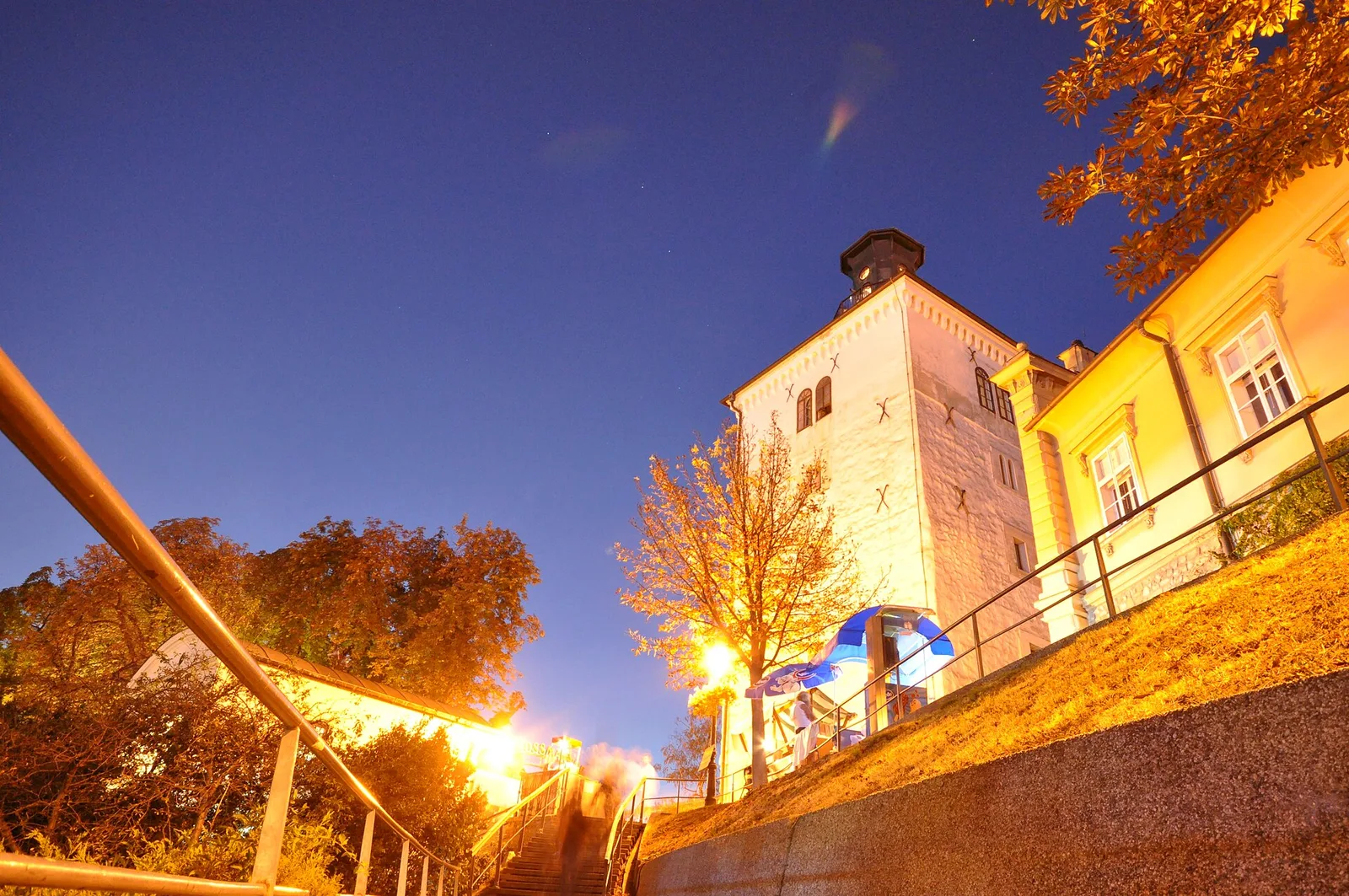 Lotrscak Tower illuminated at dusk above the Zagreb Funicular