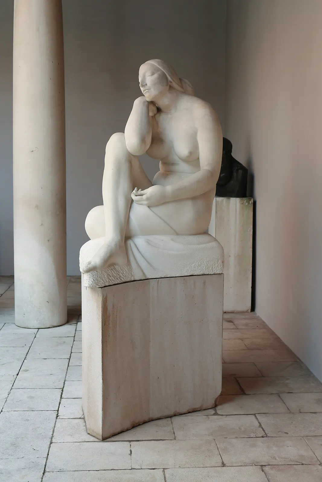Seated stone figure at Meštrović Atelier Zagreb in 2019