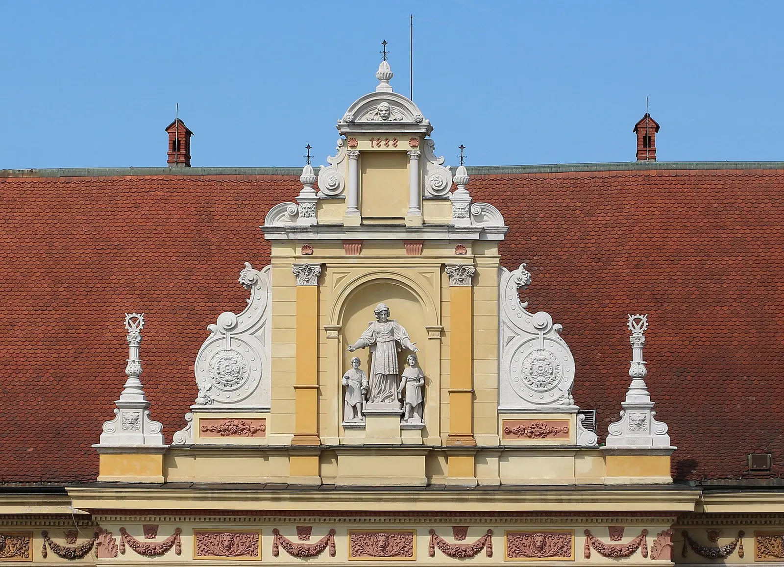 Sculpted pediment detail on the Museum of Arts and Crafts facade