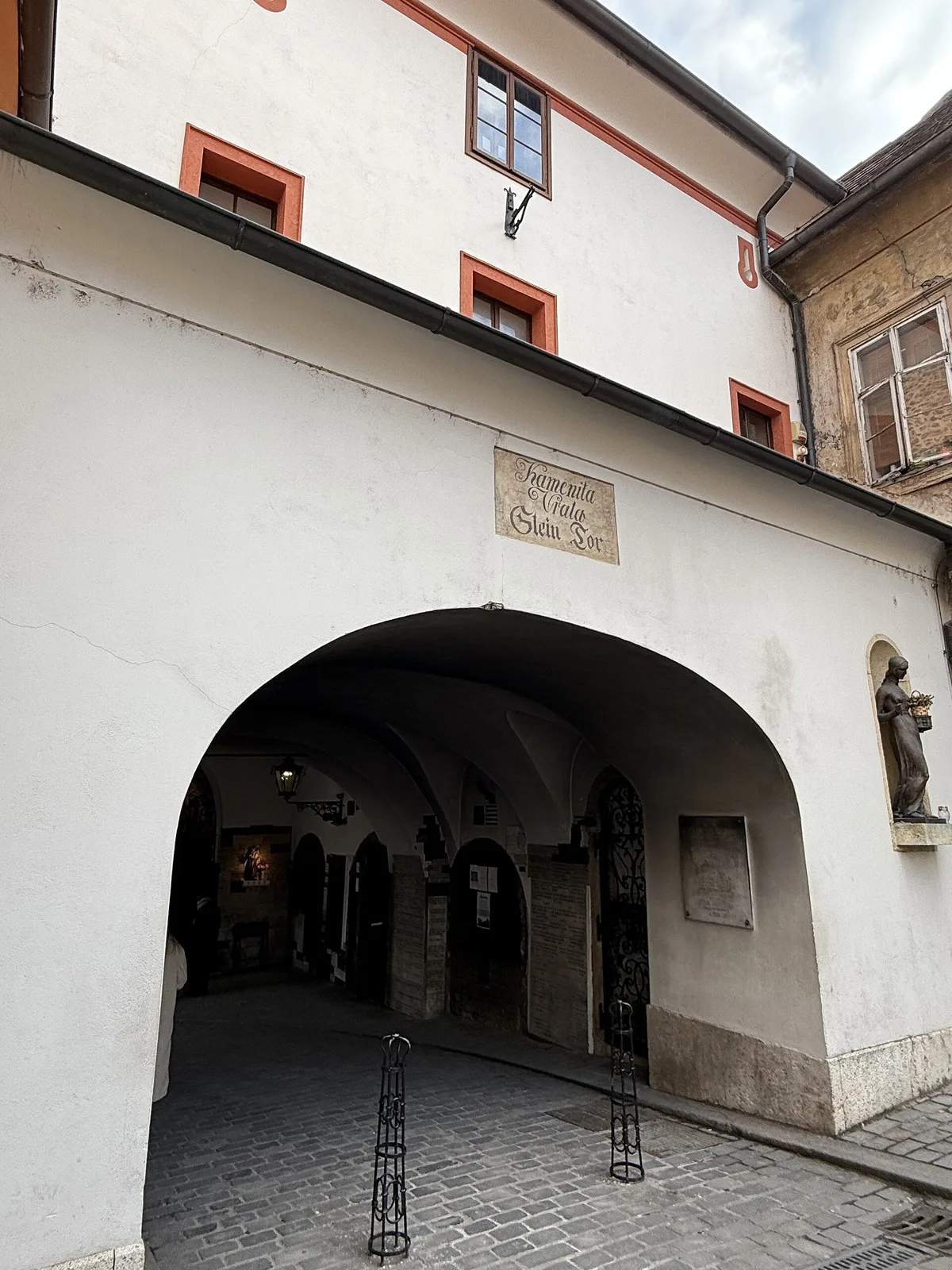 White exterior arch and passage of Zagreb's Stone Gate in 2025