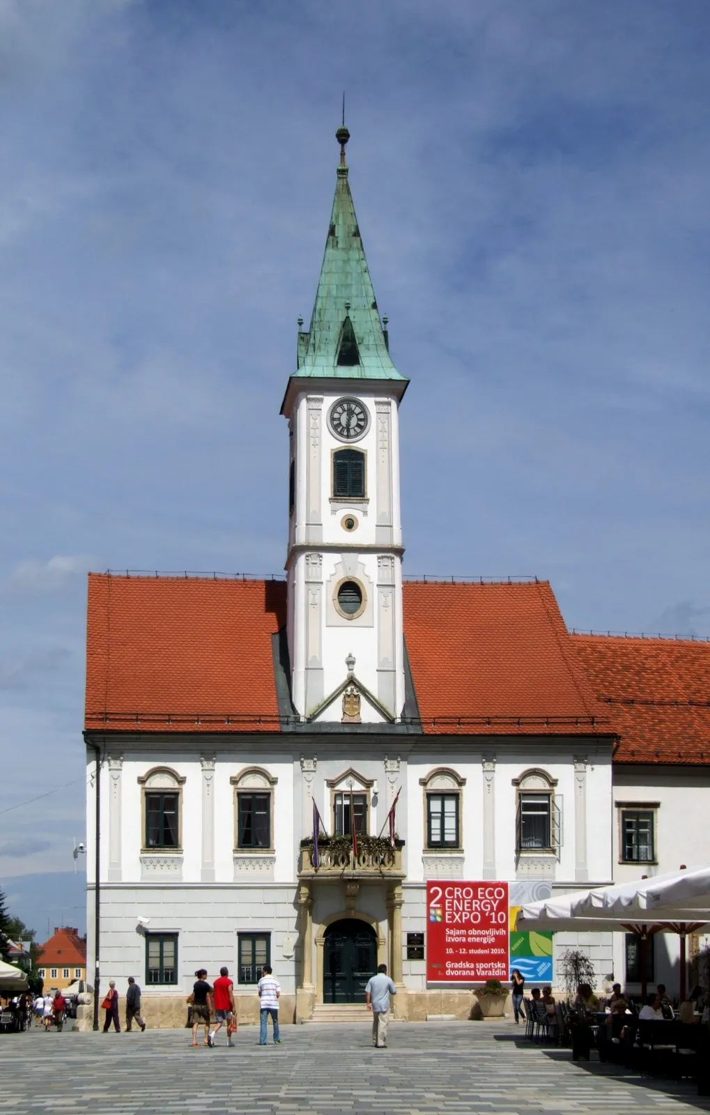 The white Varaždin Town Hall and clock tower facing King Tomislav Square
