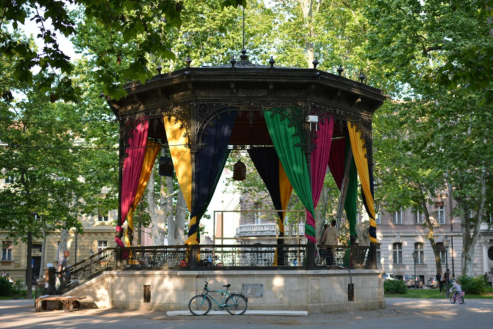 Octagonal music pavilion beneath mature trees in Zrinjevac park